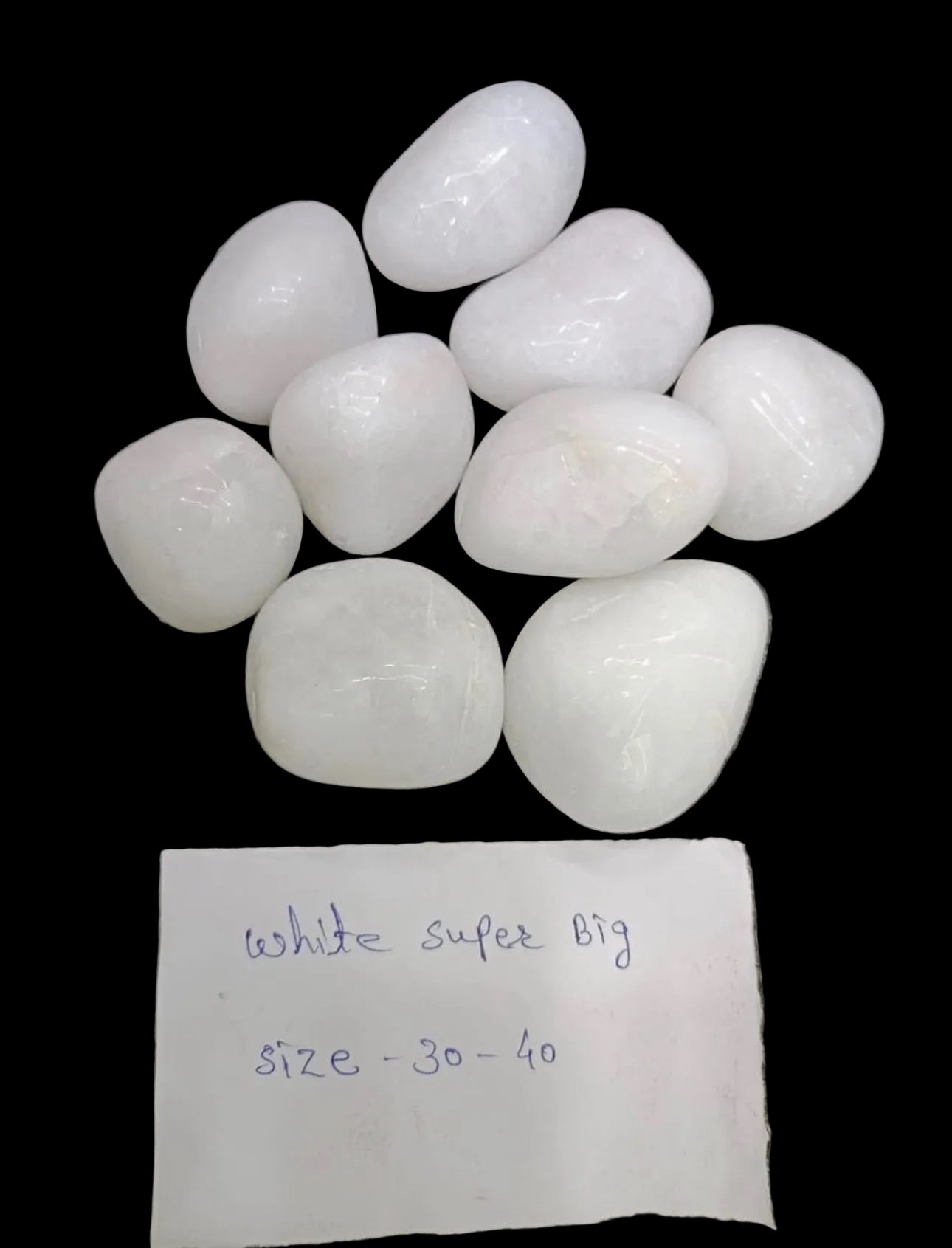white pollished pebbles rodi